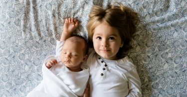 Tips to Help Your Child Adjust to Your Newborn